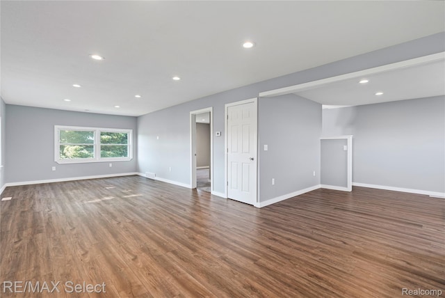 4470 N Lake Rd, Columbiaville, MI 48421 - empty room featuring dark wood finished floors and recessed lighting