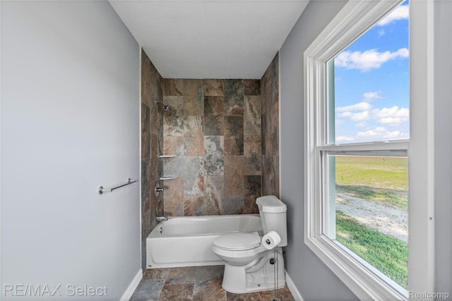 4470 N Lake Rd, Columbiaville, MI 48421 - full bath with stone finish flooring and shower / bath combination