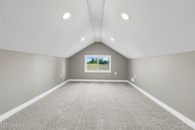 4470 N Lake Rd, Columbiaville, MI 48421 - additional living space featuring carpet, vaulted ceiling, and recessed lighting