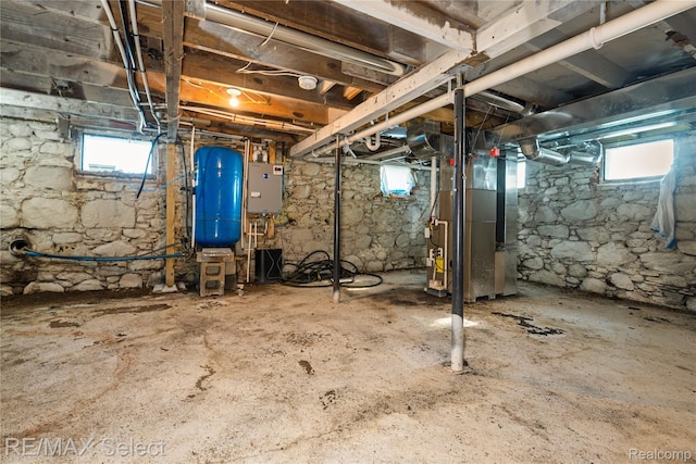 4470 N Lake Rd, Columbiaville, MI 48421 - below grade area with a water pressure tank, water heater, and heating unit