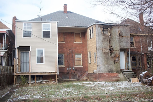 3309 Lothrop St, Detroit, MI 48206 - back of house featuring a shingled roof, brick siding, and a chimney