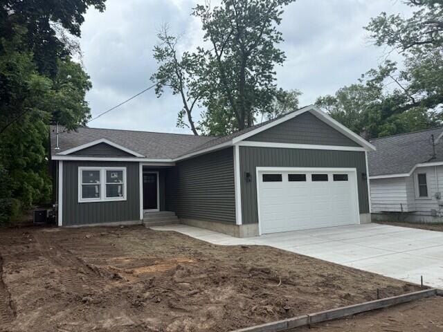 561 Mary St, Muskegon, MI 49442 - single story home with a garage and driveway