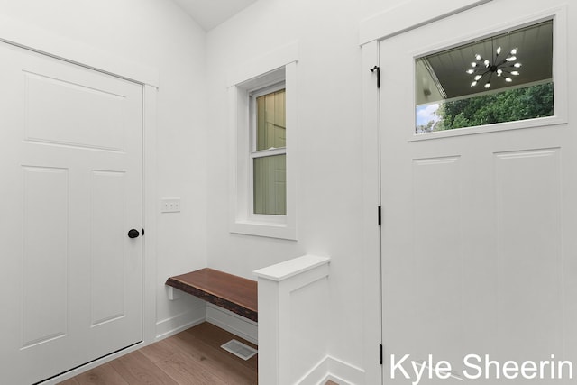 8060 Hunters Xing, Kalamazoo, MI 49009 - entryway with baseboards and wood finished floors