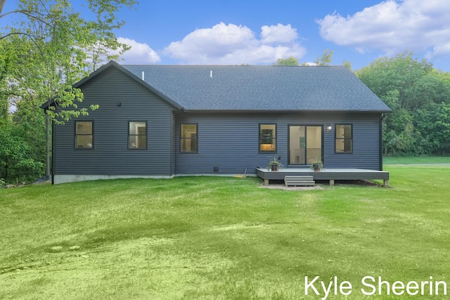 8060 Hunters Xing, Kalamazoo, MI 49009 - back of property featuring a deck, a yard, and a shingled roof
