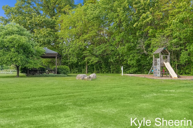 8060 Hunters Xing, Kalamazoo, MI 49009 - view of green lawn featuring a playground and a gazebo