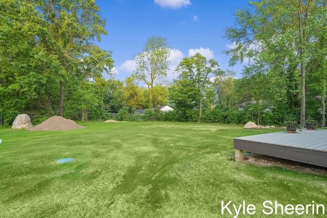 8060 Hunters Xing, Kalamazoo, MI 49009 - view of grassy yard with a wooden deck