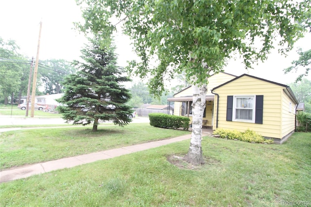 34813 John St, Wayne, MI 48184 - view of front of home with a front lawn
