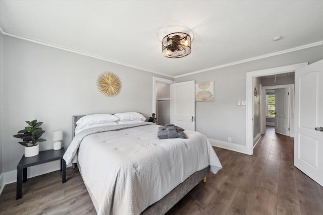 289 Newport St, Detroit, MI 48215 - bedroom featuring baseboards, wood finished floors, and crown molding