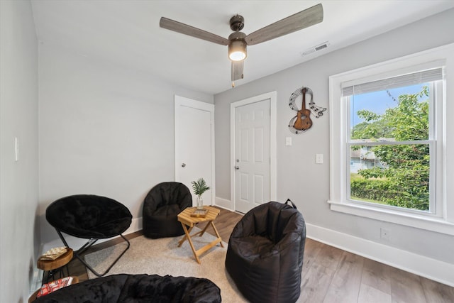 289 Newport St, Detroit, MI 48215 - living area featuring baseboards, ceiling fan, and wood finished floors