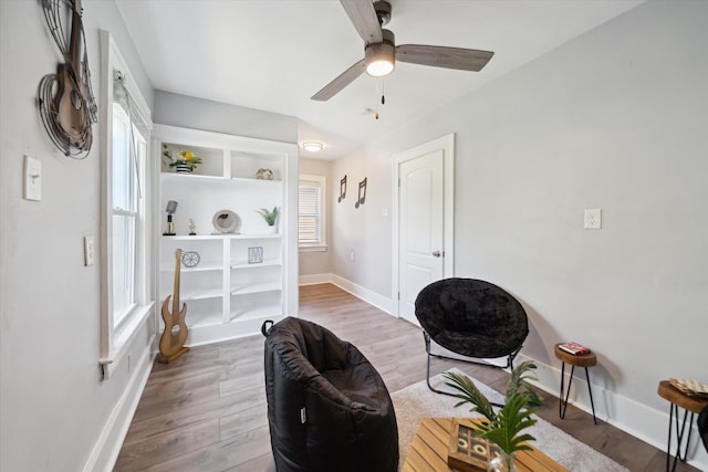 289 Newport St, Detroit, MI 48215 - sitting room with baseboards, wood finished floors, and ceiling fan