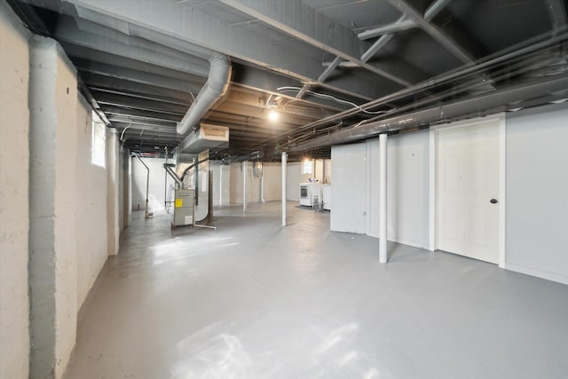 289 Newport St, Detroit, MI 48215 - basement featuring heating unit and independent washer and dryer