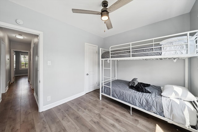 289 Newport St, Detroit, MI 48215 - bedroom featuring wood finished floors, baseboards, and ceiling fan