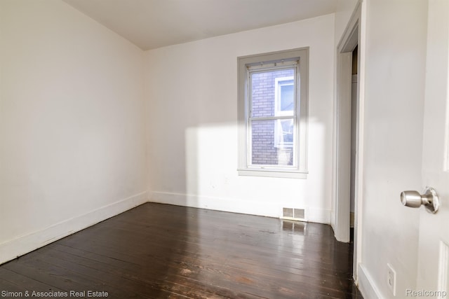 11620 Nagel St, Hamtramck, MI 48212 - unfurnished room featuring dark wood-style floors and baseboards