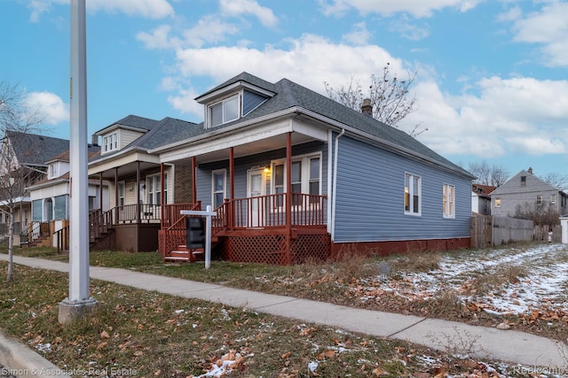 11620 Nagel St, Hamtramck, MI 48212 - view of front facade featuring a porch and roof with shingles