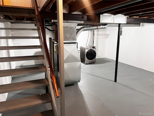 25731 Salem Ct Unit 63, Roseville, MI 48066 - unfinished below grade area featuring washer and dryer, stairway, and heating unit
