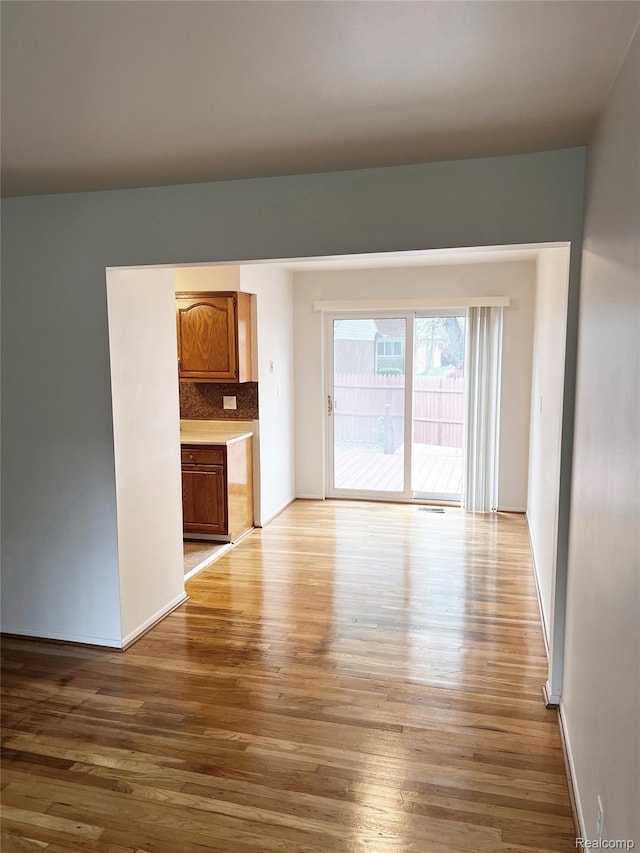 25731 Salem Ct Unit 63, Roseville, MI 48066 - unfurnished living room with wood finished floors