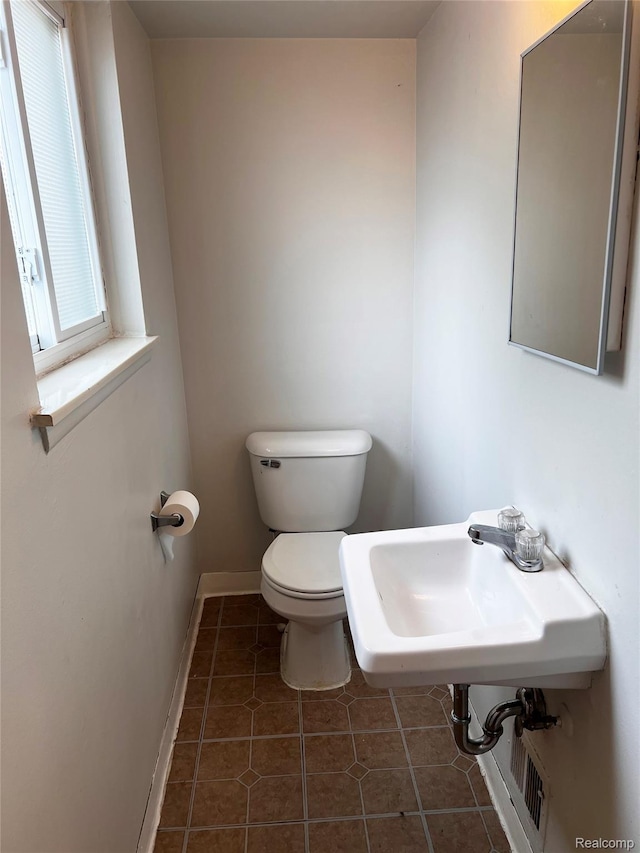25731 Salem Ct Unit 63, Roseville, MI 48066 - bathroom with toilet and tile patterned flooring