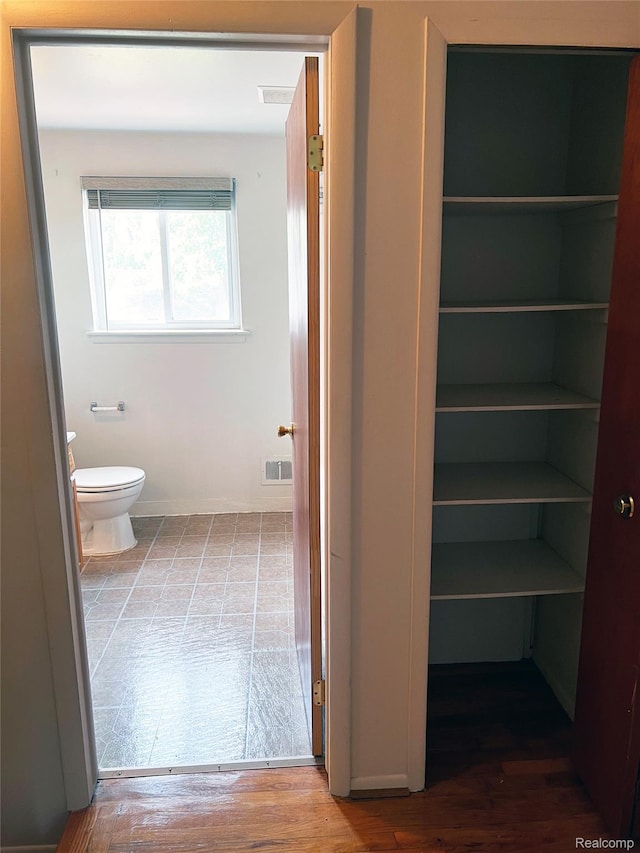 25731 Salem Ct Unit 63, Roseville, MI 48066 - bathroom with toilet and baseboards