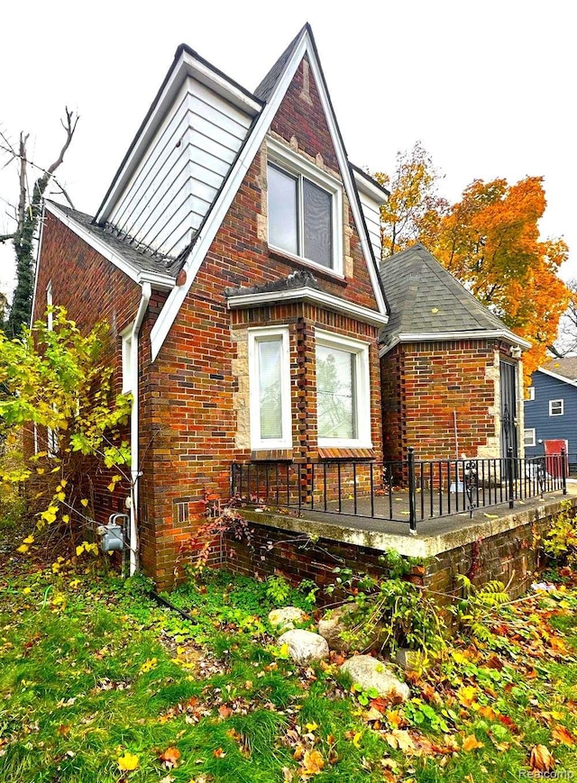 15395 Littlefield St, Detroit, MI 48227 - view of property exterior featuring a deck and brick siding