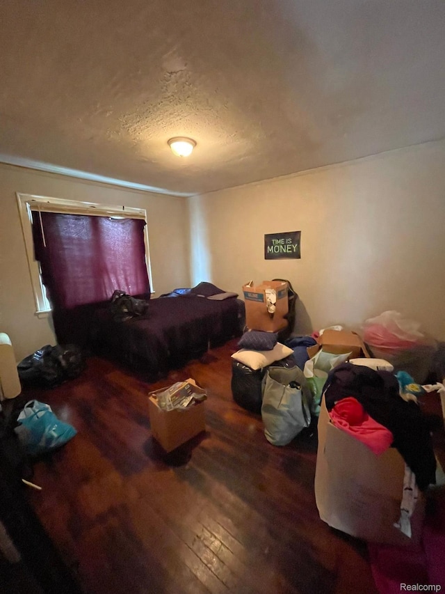 15395 Littlefield St, Detroit, MI 48227 - bedroom with wood finished floors and a textured ceiling