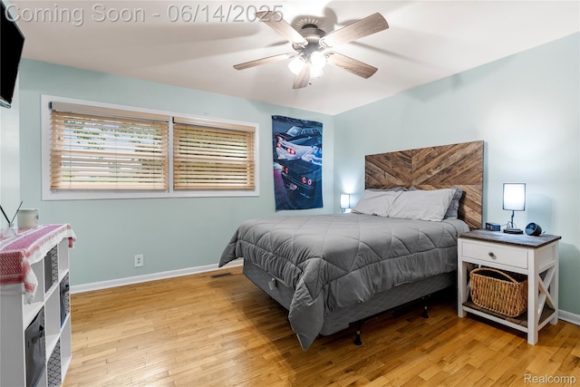 5388 N Georgetown Rd, Grand Blanc, MI 48439 - bedroom with light wood-style flooring and a ceiling fan