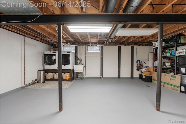 5388 N Georgetown Rd, Grand Blanc, MI 48439 - below grade area with washing machine and dryer and concrete block wall