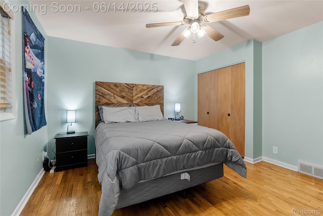 5388 N Georgetown Rd, Grand Blanc, MI 48439 - bedroom with wood-type flooring, a closet, and a ceiling fan