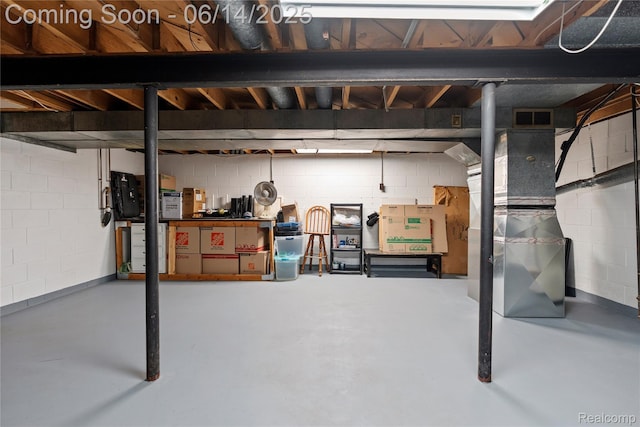 5388 N Georgetown Rd, Grand Blanc, MI 48439 - unfinished below grade area with concrete block wall and heating unit