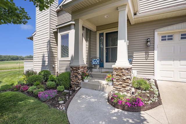 1300 St Andrews Dr, Holland, MI 49423 - property entrance with covered porch and a garage