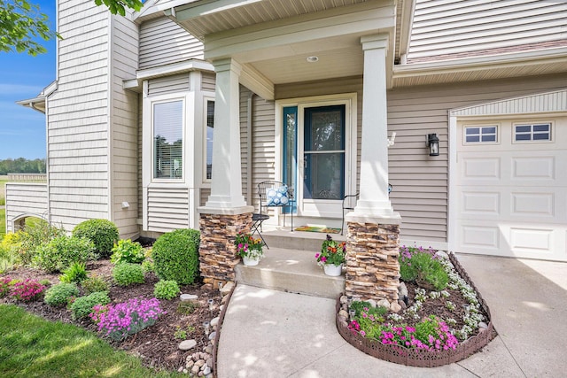 1300 St Andrews Dr, Holland, MI 49423 - property entrance featuring a porch and a garage