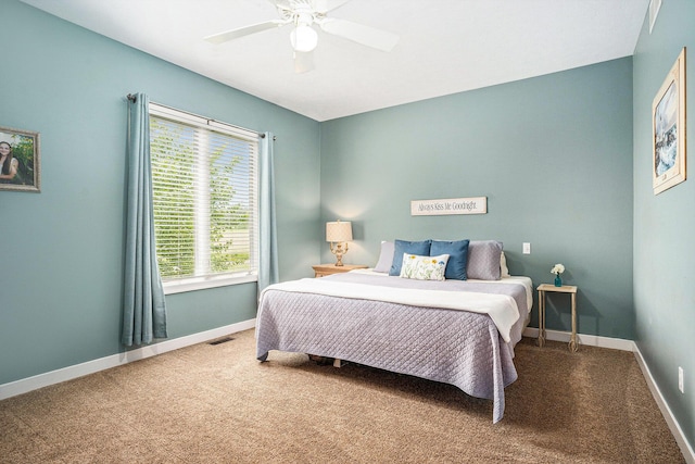 1300 St Andrews Dr, Holland, MI 49423 - carpeted bedroom with baseboards and ceiling fan