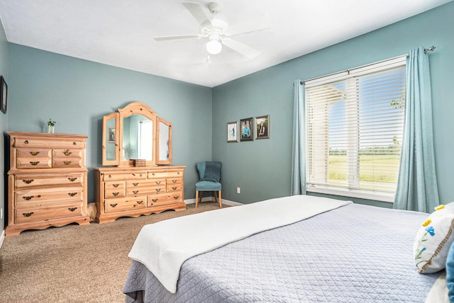 1300 St Andrews Dr, Holland, MI 49423 - bedroom with carpet floors, ceiling fan, and baseboards