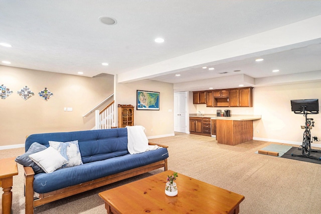 1300 St Andrews Dr, Holland, MI 49423 - living area featuring baseboards, wet bar, recessed lighting, stairway, and light carpet