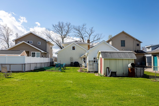 114 W Grove Ave, Michigan Center, MI 49254 - rear view of house with board and batten siding
