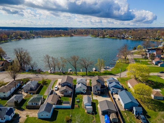 114 W Grove Ave, Michigan Center, MI 49254 - aerial view of residential area featuring a nearby body of water
