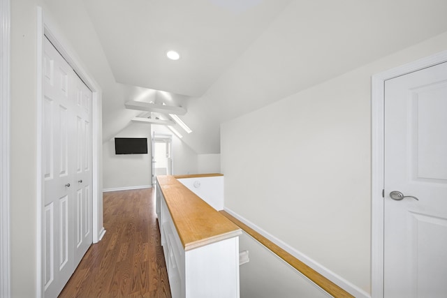 4422 Groveland Ave, Royal Oak, MI 48073 - corridor with dark wood-type flooring, lofted ceiling, baseboards, and an upstairs landing
