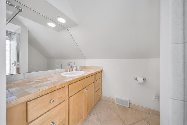 4422 Groveland Ave, Royal Oak, MI 48073 - bathroom with vaulted ceiling, vanity, baseboards, a shower with shower door, and tile patterned floors