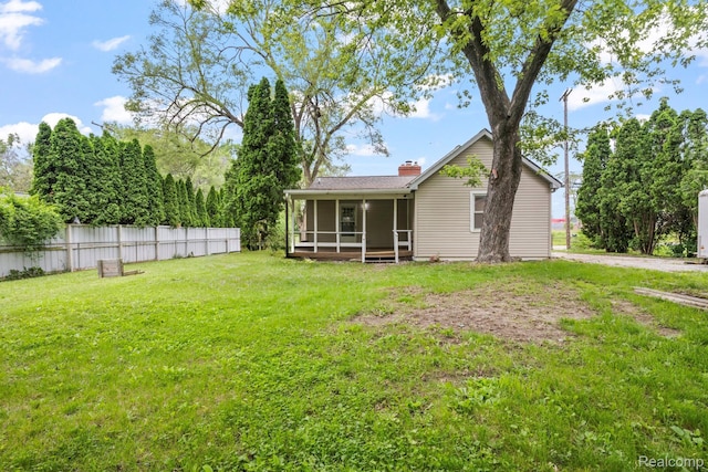 1496 E Parkwood Ave, Burton, MI 48529 - view of yard featuring a sunroom