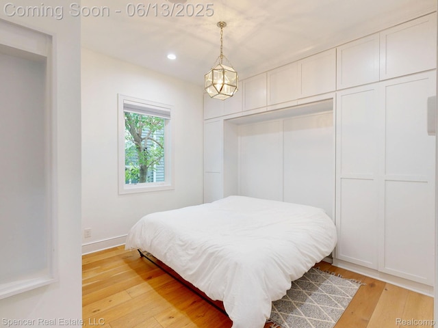 571 Dunleavy Dr, Highland, MI 48356 - bedroom featuring light wood finished floors, recessed lighting, and baseboards