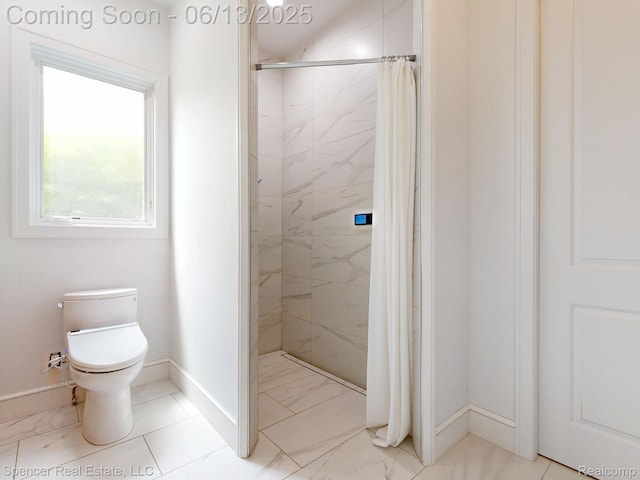 571 Dunleavy Dr, Highland, MI 48356 - bathroom with baseboards, toilet, a tile shower, and marble look tile flooring
