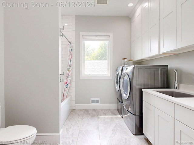 571 Dunleavy Dr, Highland, MI 48356 - washroom featuring washer and clothes dryer, light marble finish flooring, baseboards, and recessed lighting