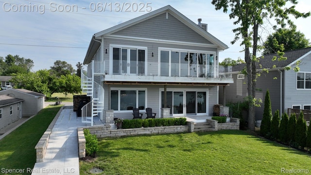 571 Dunleavy Dr, Highland, MI 48356 - back of house with a yard and stairs