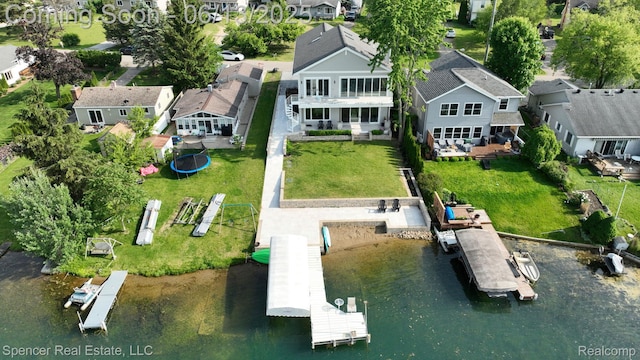571 Dunleavy Dr, Highland, MI 48356 - aerial view of residential area featuring a large body of water
