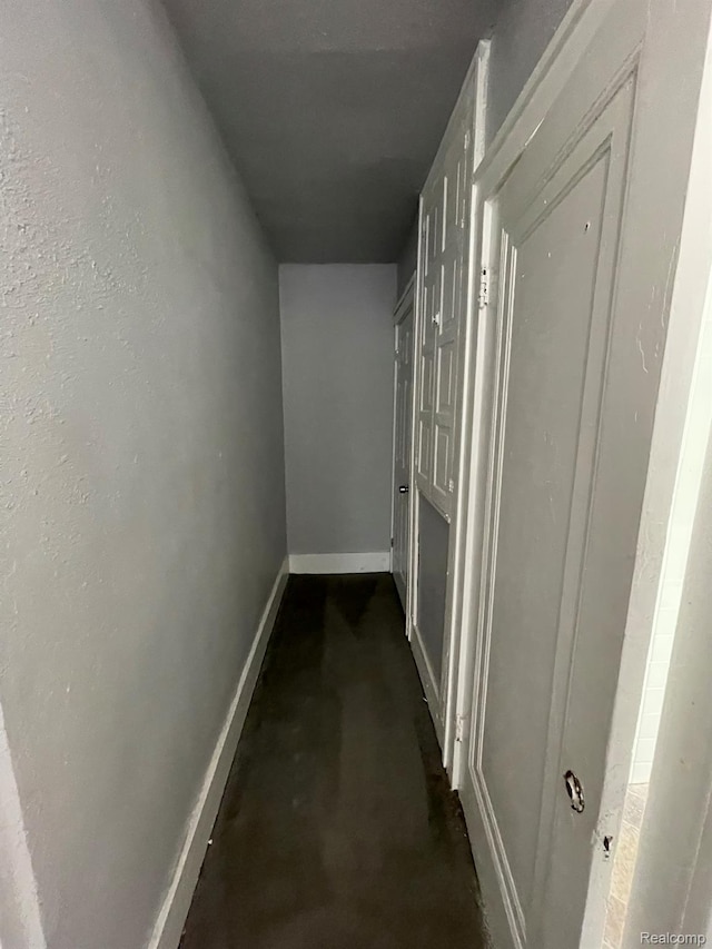 4368 Buckingham Ave, Detroit, MI 48224 - hall featuring concrete floors and baseboards