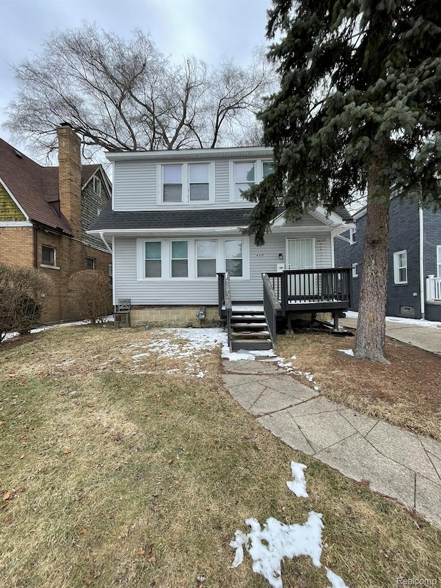 4368 Buckingham Ave, Detroit, MI 48224 - view of front facade featuring a wooden deck and a front lawn