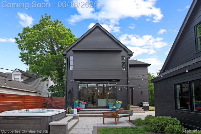 1044 Hazel, Birmingham, MI 48009 - rear view of property featuring a hot tub and a patio