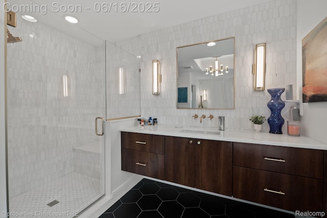 1044 Hazel, Birmingham, MI 48009 - bathroom featuring tile patterned floors, vanity, a stall shower, and a chandelier