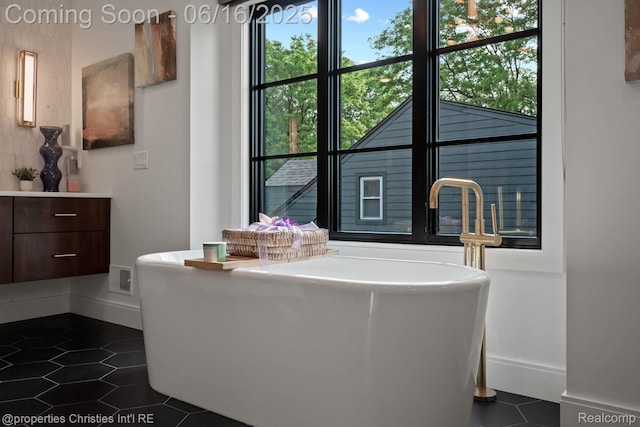 1044 Hazel, Birmingham, MI 48009 - full bath with a soaking tub and tile patterned flooring