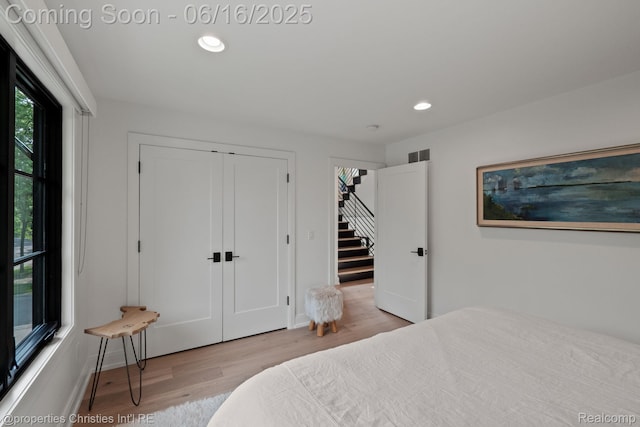 1044 Hazel, Birmingham, MI 48009 - bedroom featuring recessed lighting, wood finished floors, and a closet