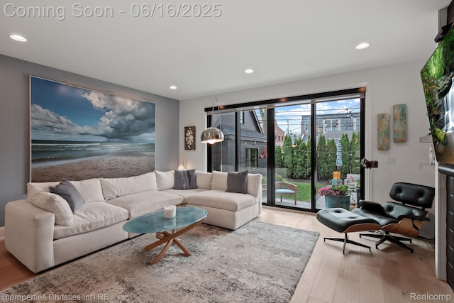 1044 Hazel, Birmingham, MI 48009 - living room with wood finished floors and recessed lighting